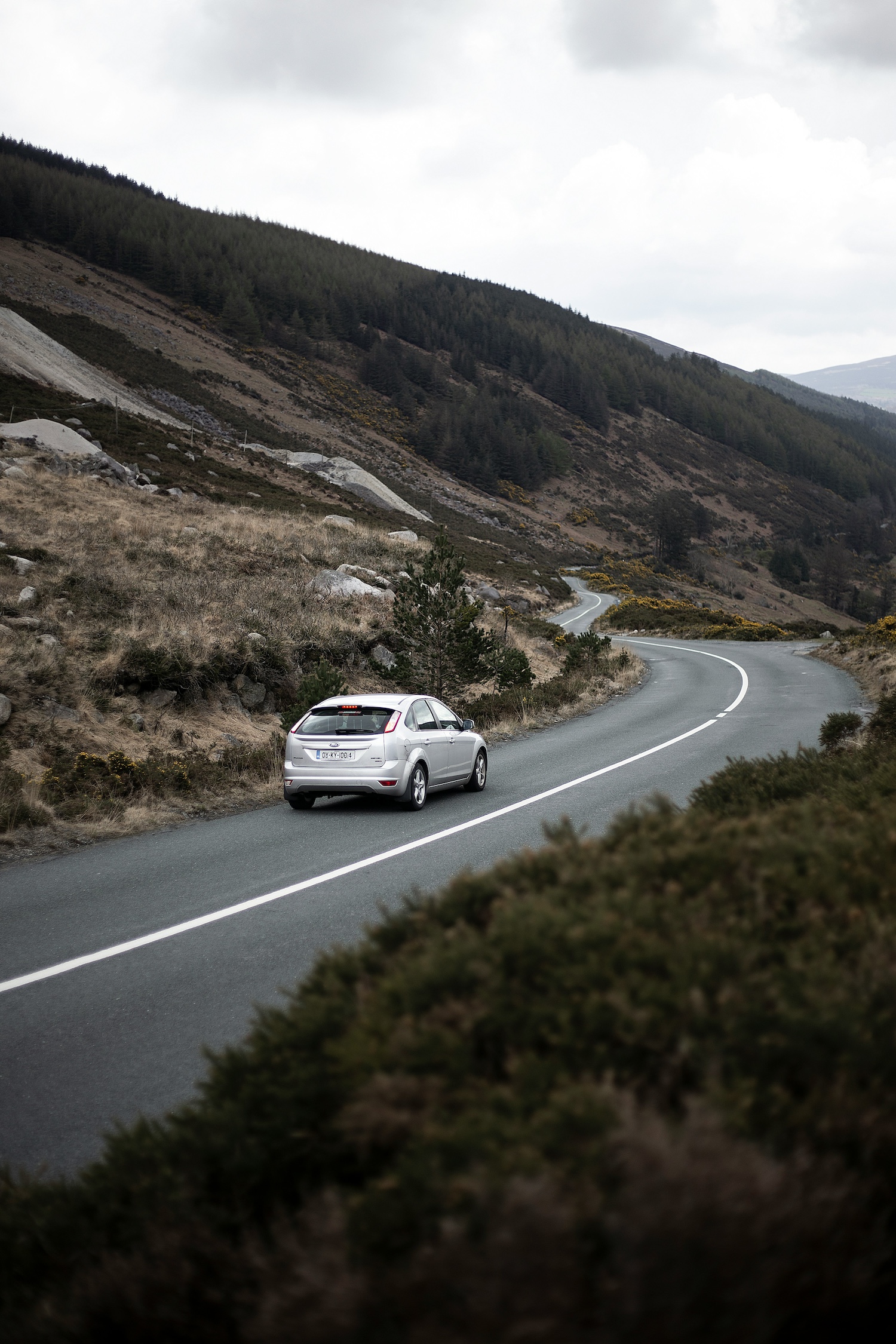 Ford Focus driving on an Irish country road